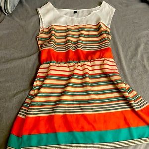 Dress with orange, white and blue stripes